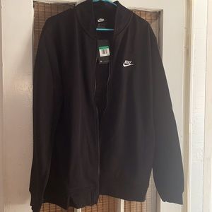 Nike men’s black zipper jacket size XL. New with tag